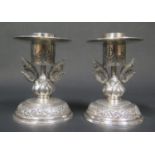 A Pair of Cambodian Silver Candlesticks with fish flanked stems, 10.5cm, 263g