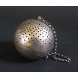 An Antique White Metal Infuser on chain, 5.5cm diam., 41g