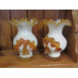 A Pair of Opaque Glass Vases with frilly amber decoration, 17.5cm