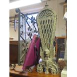 A Brass 'Peacock' Fire Screen, wrought iron fire screen, portfolio of prints and magazine rack