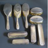 Nine Silver Backed Brushes