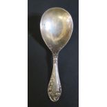 An Edward VII Silver Caddy Spoon with rose decoration, Birmingham 1905, Levi & Salaman, 13.8g