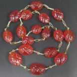 A Carved Carnelian Necklace