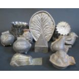 A Collection of Hinged Pewter Butter or Ice Cream Moulds etc. (leaf mould 13cm)