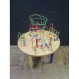 A Kid's Wooden Bead Activity Table, 68cm diam.