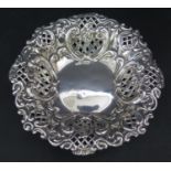 A Victorian Silver Bonbon Dish with embossed and pierced decoration, Birmingham 1897, 12cm diam.,