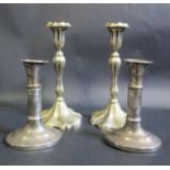 A Pair of Victorian Silver Plated Candlesticks with chased foliate decoration and one other pair A/F