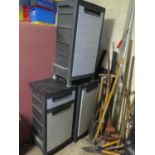 Three Plastic Garage Storage Units