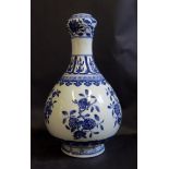 A Chinese Republican Period Blue and White Porcelain Vase painted with foliate work, apocryphal seal