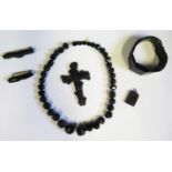 A Selection of Whitby Jet Jewellery including carved cross