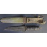 A WWII American KA-BAR U.S.N. Marine Corps MK 2 Knife with original sheath