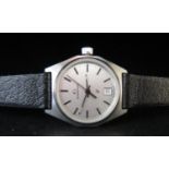 A Cased Ladies GARRARD Q Steel Cased Quartz Wristwatch, appears unworn. Needs new battery