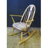 An Ercol Swan Back Rocking Chair, 91cm high