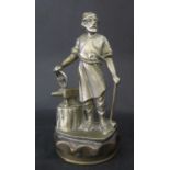 A BRASS VULCAN CAR MASCOT RADIATOR CAP formed as a blacksmith with anvil 12cm high