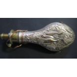 A Silvered Copper Powder Flask with game birds and foliate embossed decoration.