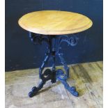 An Elm Top Cast Iron Bistro Table, 60cm diam. x 70.5cm high