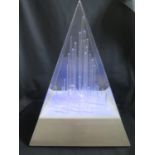 A Decorative Modern Pyramid Led Light Display Unit With Remote Control For Various Settings & Modes.