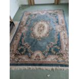 A Chinese Blue Ground Wash Rug, 340x243cm