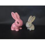 A Sylvac Pink Rabbit 965 (6") and Bourne Denby rabbit ( 4 3/4") & Midwinter Larry The Lamb