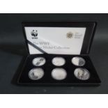 The Royal Mint _ The WWF Silver Medal Collection, a ltd. ed. (2000) cased set of six with COA