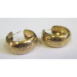 A Large Pair of 9ct Gold Hoop Earring engraved with scrolling foliate work, 25mm diam., 11mm wide,