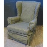 A Parker Knoll Wing Back Fireside Chair