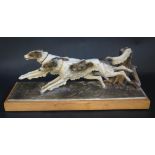 A Cold Painted Spelter Wolf Hound Table Lighter, 31cm long