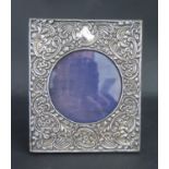 An Edward VII Embossed Silver Photograph Frame, Birmingham 1906, Walker & Hall, 3.5" aperture