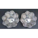 A Pair of Victorian Silver Bonbon Dishes with embossed and pierced decoration, Chester 1900, James