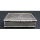 A Large William IV Silver and Gilt Lined Snuff Box with raised foliate scroll borders, engine turned