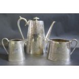 An Electroplated Silver Three Part Coffee Set with chased foliate decoration