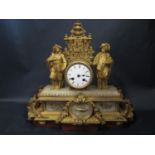 A 19th Century French Gilt Spelter Clock on late wooden stand, 36cm high