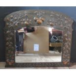 An Art Nouveau Copper Mirror with embossed fruiting foliate work, 106cm width x 89cm height