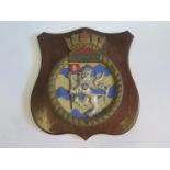 An H.M.S. Churchill Shield (10" high) on wooden shield boss
