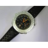 An HEUER Automatic Calculator Wristwatch with Cal. 15 movement, fluorescent orange hands and rare