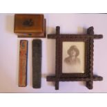 A Tramp Art Chip Carved Photo Frame, c. 4.5x3.5" aperture, Mauchline ware box decorated with Holy