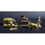 An Antique Indian Bronze of a recumbent cow on plinth (base 6.5cm) and others