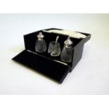 A George V Silver Presentation Cased Cruet Set with matching spoon, Birmingham 1930, Barker Brothers