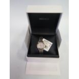 A Boxed Ladies Seiko Wristwatch with mother of pearl and diamond set dial. Needs battery, not tested