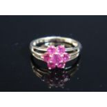 A 14K Gold and Ruby Flower Head Cluster Ring, size S, 3.6g
