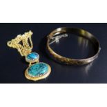 A Gold Plated Malachite Pendant Necklace and rolled gold hinged bangle with chased foliate