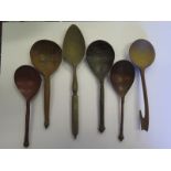 A Collection of Russian Treen Spoons and a pair of late 19th century Russian cast iron oak leaf