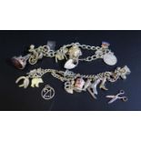 A Silver Charm Bracelet (some white metal) 61g and one other