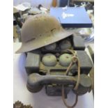 A Pair of Military Mk. II Field Telephones and Brodie helmet