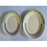 A Pair of Graduated Clarice Cliff Bizarre Oval Platters, largest 36.5cm. Small one with crazing