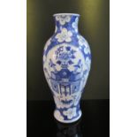 An 18th Century Chinese Blue and White Vase, six character mark to base, 23cm high