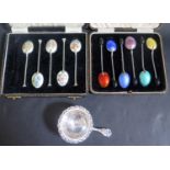 A George V Cased Set of Six Silver and Enamel Coffee Bean Finial Spoons, Birmingham 1928, Henry