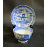 A Blue and White Porcelain Tea Bowl with matching saucer