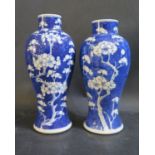 Two 19th Century Chinese Blue and White Porcelain Prunus Decorated Vases, tallest 23cm. Tallest with