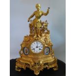 A Miroy Fres. Gilt Spelter Mantle Clock with Sevres style porcelain panels under glass dome, 56cm